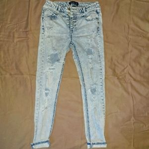 Blue spice ripped Mid rise jegging light wash blue color size 5 womens